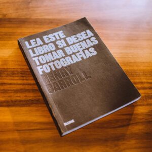 Photography guidebook displayed on a wooden table, highlighting its cover design.